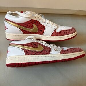 Nike White and Gold Sneakers with Red Accents